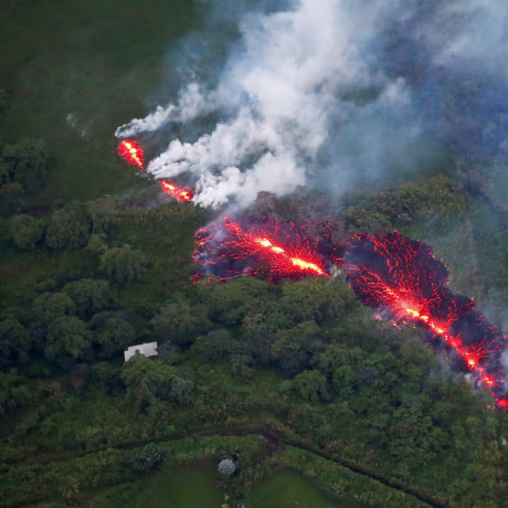 Image: Lava erupts from a fissure east of the Leilani Estates subdivision during ongoing eruptions of the Kilauea volcano