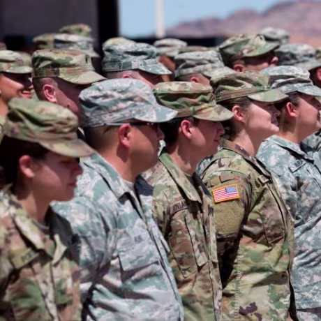 Members of the Arizona National Guard listen to instructions on April 9, 2018, at the Papago Park Military Reservation in Phoenix. - Arizona deployed its first 225 National Guard members to the Mexican border on Monday after President Donald Trump ordered thousands of troops to the frontier region to combat drug trafficking and illegal immigration.