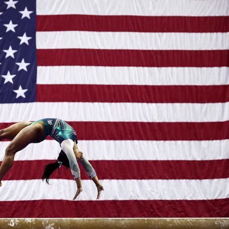 Simone Biles competes on the balance beam during the Senior Women's competition at the U.S. Gymnastics Championships in Kansas City, Missouri, on Aug. 9, 2019.