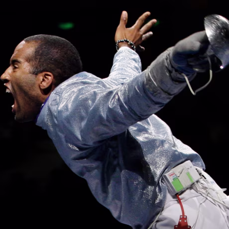 Keeth Smart celebrates after defeating Russia 45-44 in the semifinals of the men's team saber in fencing during the Beijing 2008 Olympics.