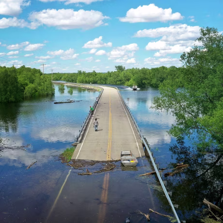 Floodwater from the Mississippi River cuts off the roadway from Missouri into Illinois at the states' border on May 30, 2019