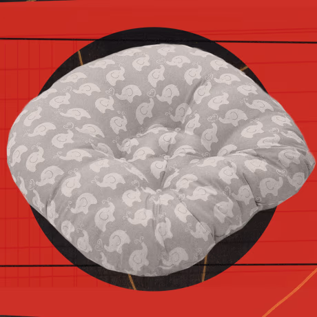 "Baby Boppy" against red textured backdrop 
