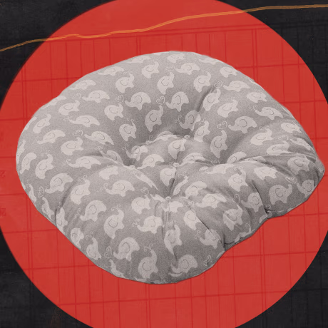 Photo illustration of a Boppy brand baby lounger.