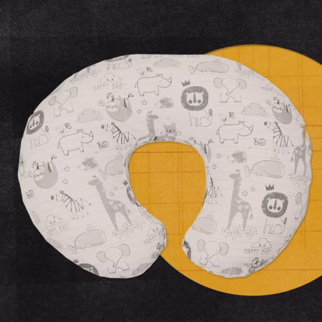 Photo illustration of a Boppy brand nursing pillow.