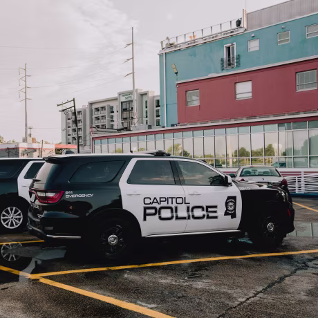 Capitol Police cars outside of Fondren Corner in Jackson, Miss., on June 2, 2023.