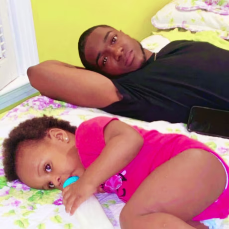 Jaylen Lewis with his daughter, Brooklyn