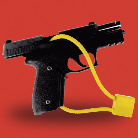 Photo illustration of a gun with a cable lock