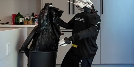 Humanoid robot cleaning a house