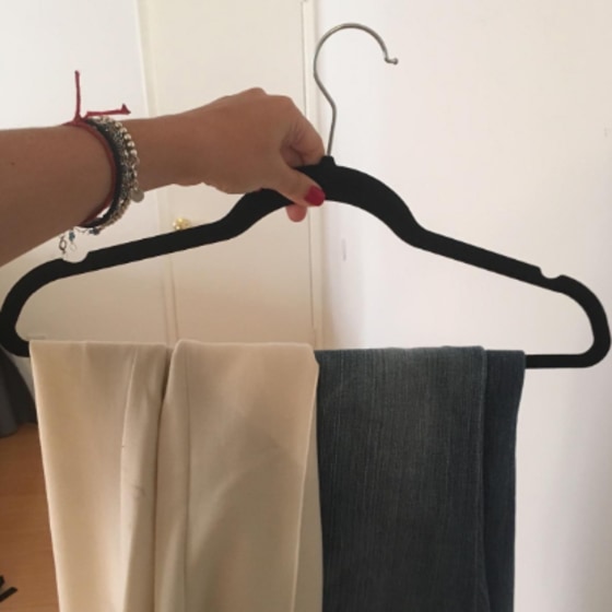 These velvet hangers keep clothes secure and save so much space