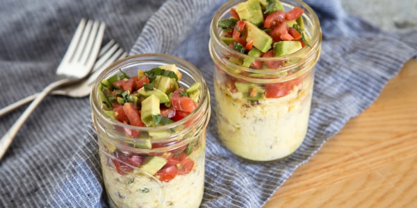 Bacon and Eggs in a Mason Jar topped with Avocado, Tomato & Basil 