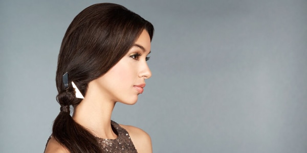 Perfect holiday hairstyles: Chic side knot ponytail
