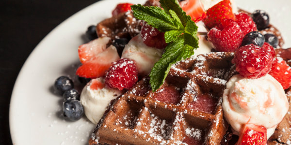 Chocolate Waffles with Cheesecake Mousse, Mixed Berries and Strawberry Sauce
