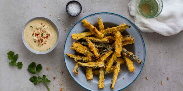 25 Minute Baked Zucchini Chips with Garlic Chermoula Dip