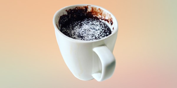 Cake in a cup with two chocolate chips