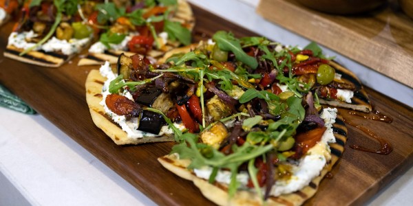 Roasted Vegetable and Herbed Goat Cheese Flatbread with Hot Honey Drizzle