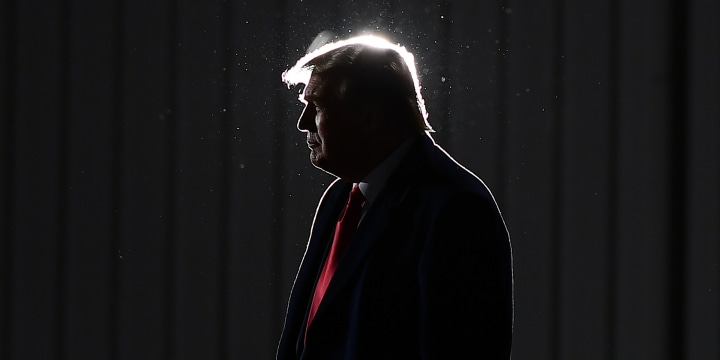 Image: Then President Donald Trump looks on as he departs a rally at Toledo Express Airport in Swanton, Ohio on Sept. 21, 2020.