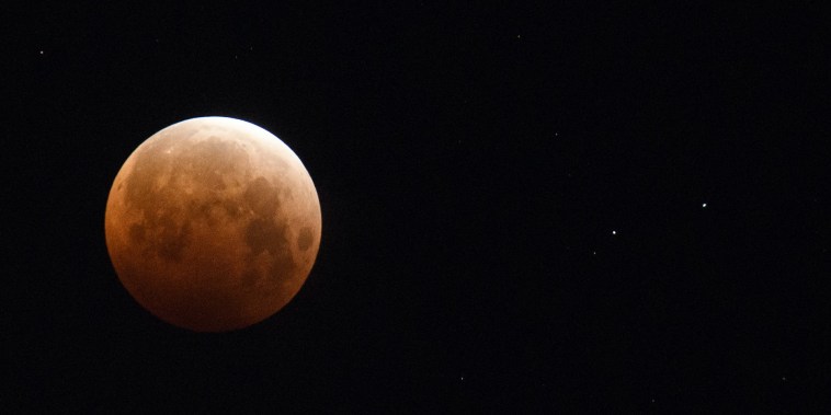 WATCH: Videos show rare lunar event known as 'super flower ...
