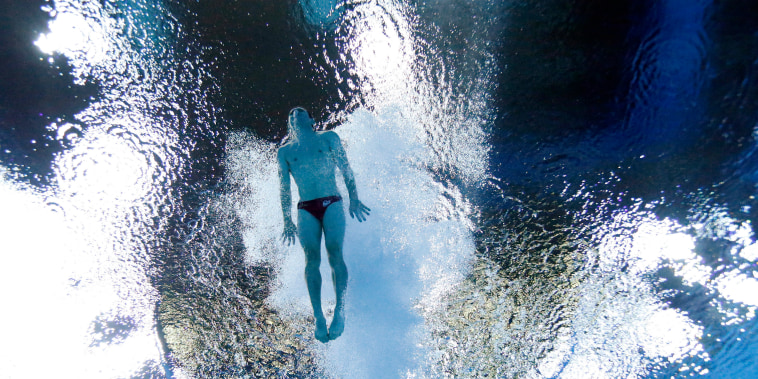 Dingley of England is seen underwater as he competes in the men's 3m Springboard final at the 2014 Commonwealth Games in Edinburgh