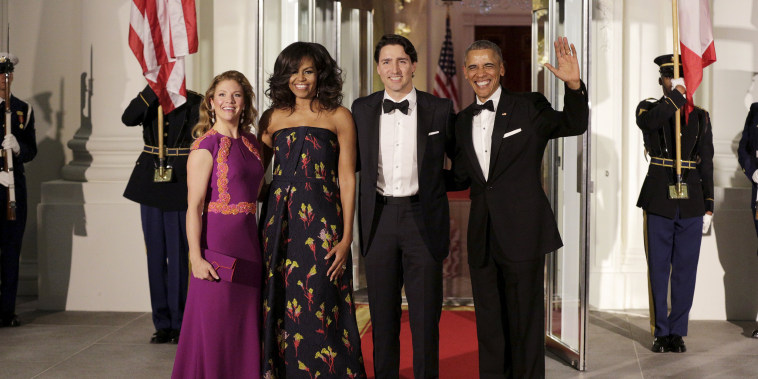 Image: U.S. President Barack Obama and first lady Michelle Obama welcome Canada's Prime Minister Justin Trudeau and his wife Sophie Gregoire-Trudeau as they arrive for a state dinner at the White House in Washington