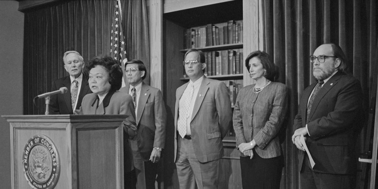 Rep. Patsy Mink announces the formation of the Congressional Asian Pacific American Caucus at a press conference with, from left, Reps. Don Edwards and Norman Mineta, Guam Delegate Robert Underwood, and Reps. Nancy Pelosi and Neil Abercrombie.