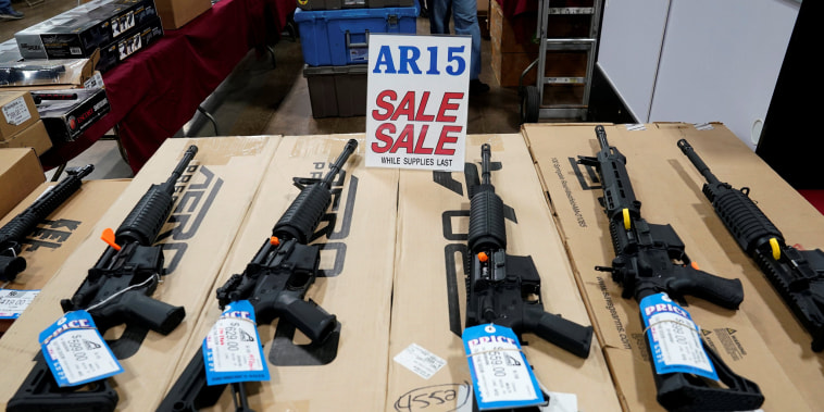 Image: AR-15 rifles on display at gun show