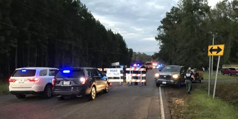 A sheriff's van was swept away in floodwaters Tuesday night near Nichols, South Carolina.