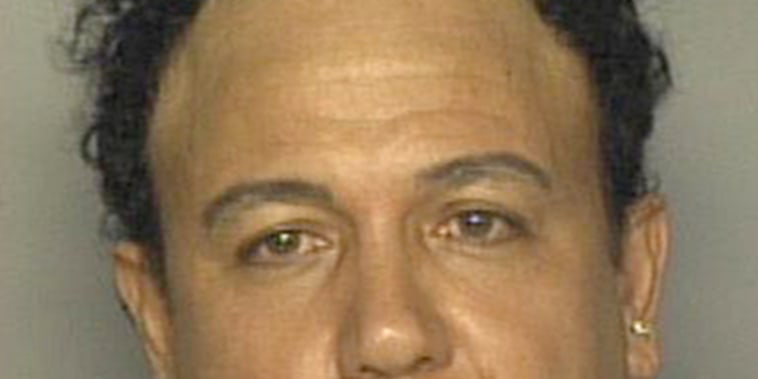 The 2002 mug shot of Caesar Syoc when he made a bomb threat, in Miami.
