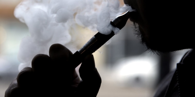 Daryl Cura demonstrates an e-cigarette at Vape store in Chicago on April 23, 2014.