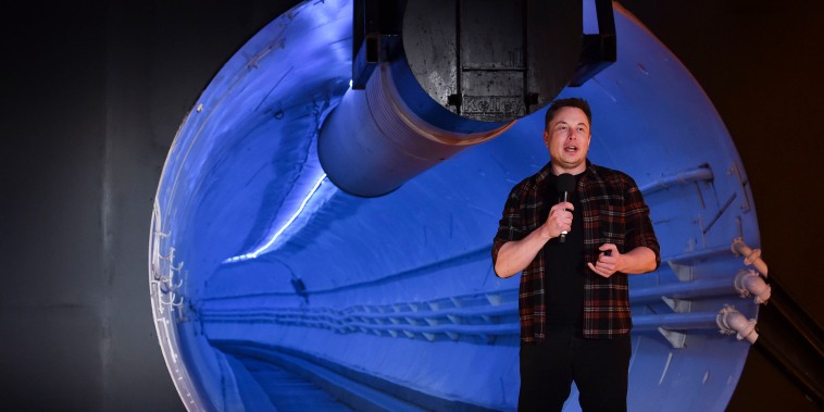 Elon Musk speaks during an unveiling event for the Boring Company Hawthorne test tunnel in Hawthorne