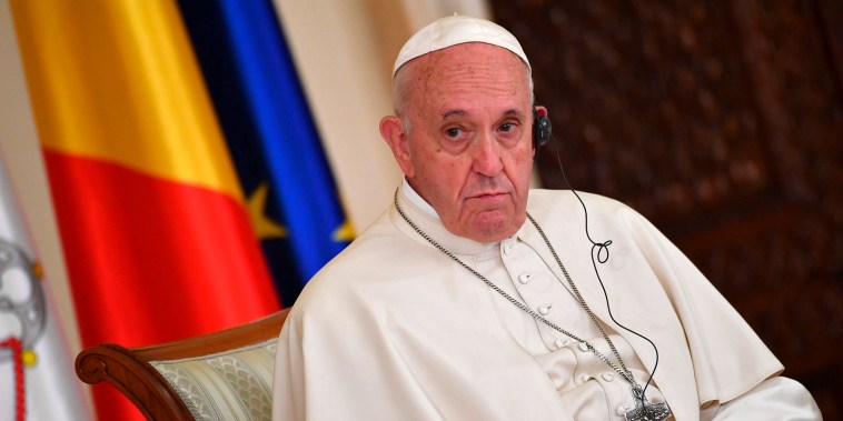 Image: Pope Francis listens to Romania's President Klaus Iohannis giving a speech at the Presidential Palace in Bucharest