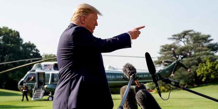 Image: President Donald Trump speaks to reporters as he leaves the White House on Aug. 7, 2019.