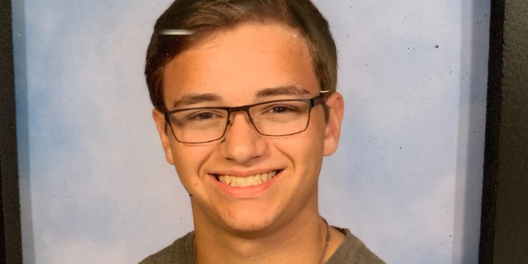 A high school student died by suicide after his family and friends say he was outed on social media by classmates.