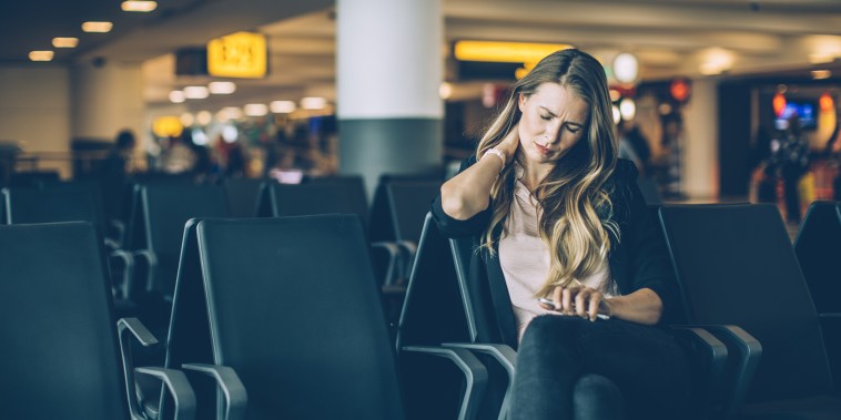Image: Woman at airport waiting area