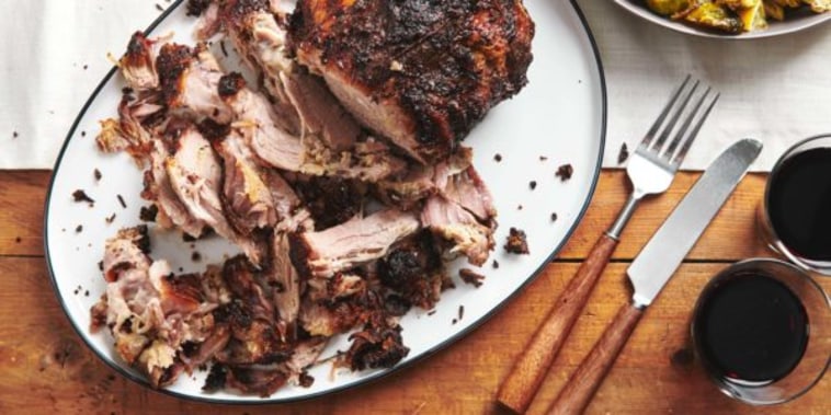 A super tender slow cooked marinated pork shoulder is a go-to dish for casual entertaining for a crowd.