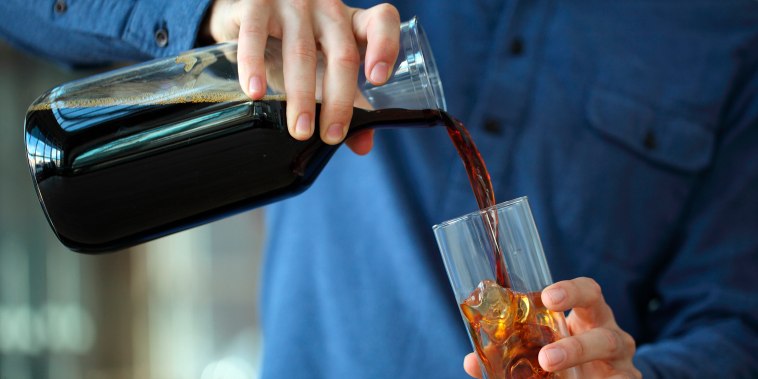 Barista making iced coffee, Kenwood, California, USA