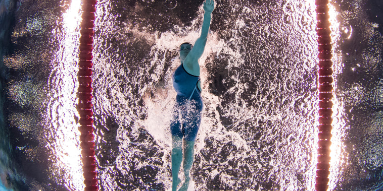 McKenzie Coan of the United States competes to win the gold medal in the women's 100-meter freestyle S7 swimming event at the Paralympic Games