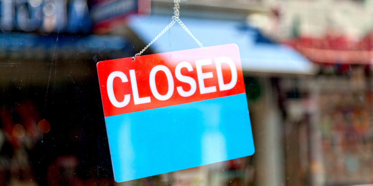 Closed sign in a window