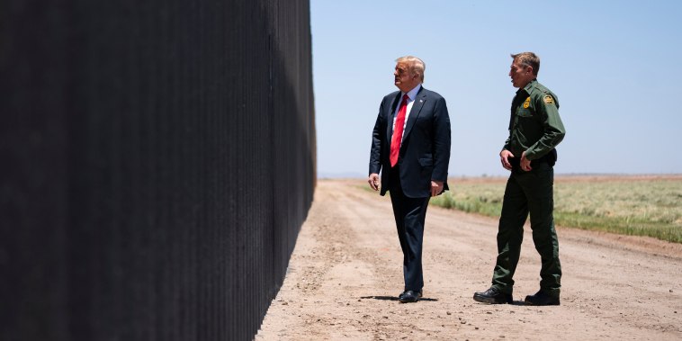 United State Border Patrol chief Rodney Scott gives President Donald Trump a tour of a section of the border wall in San Luis, Ariz., on June 23, 2020.