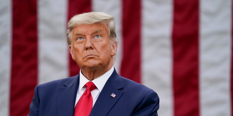 Image: President Donald Trump listens during an event on Operation Warp Speed in the Rose Garden of the White House,