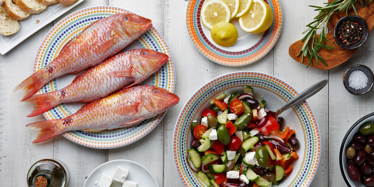 Red mullet fish and mediterranean dishes cooking