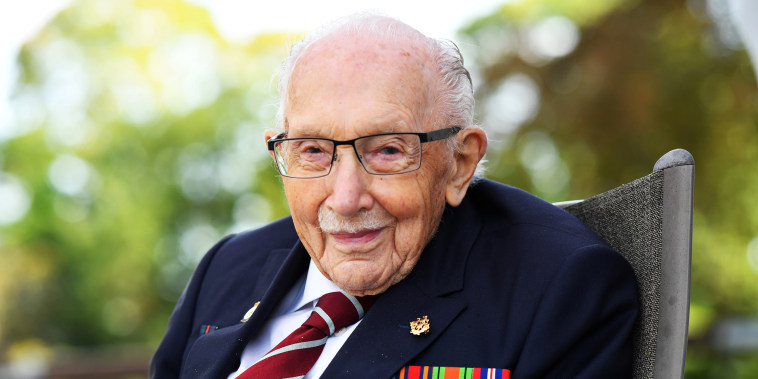 Captain Sir Tom Moore smiles as he launches his autobiography at his home in Milton Keynes