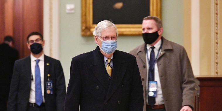Senate Minority Leader Mitch McConnell arrives at the Capitol on Feb. 13, 2021.