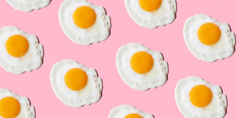 Image: Repeated fried eggs on the pink background