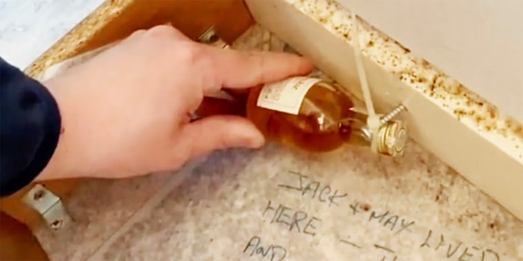 Contractor finds secret note and whisky hidden under flooring 20 years ago, posts TikTok