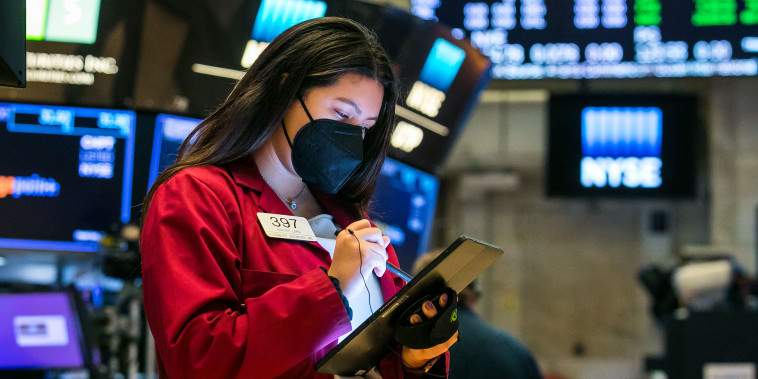 Image: A trader works at the New York Stock Exchange on March 1, 2021.