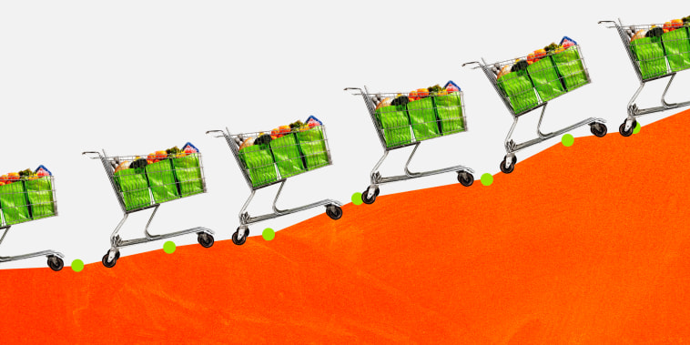 Illustration of shopping carts packed with groceries traveling up a growing line graph.