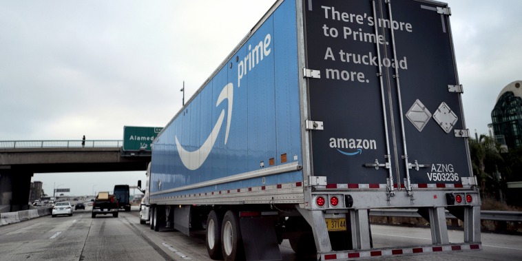 An Amazon truck makes its way along Interstate 5, towards downtown Los Angeles on June 28, 2019.