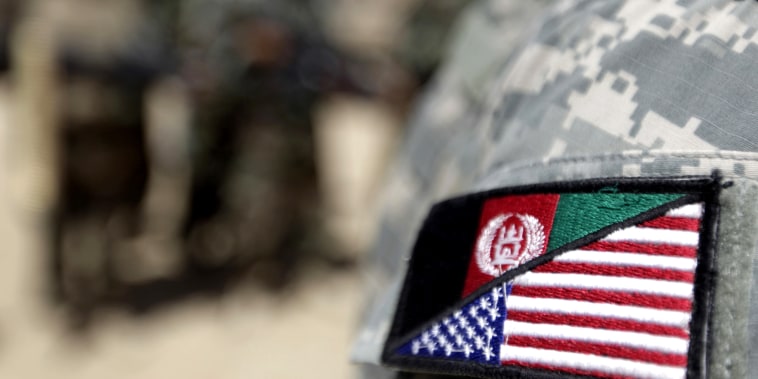 Image: An Afghan interpreter working with the 1