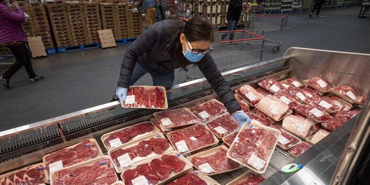 Image: A customer shops for meat inside a Costco store in San Francisco on March 3, 2021.