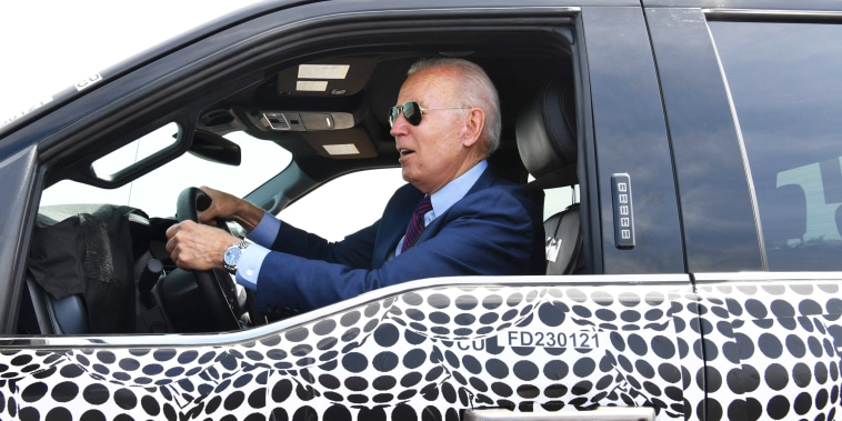 President Joe Biden drives a F-150 electric truck at the Ford Dearborn Development Center in Dearborn, Mich., on May 18, 2021.
